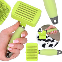 Brosse à démêler avec des picots légèrement courbés poignée confortable vert