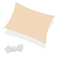 Voile solaire rectangulaire de 4x3m couleur beige.